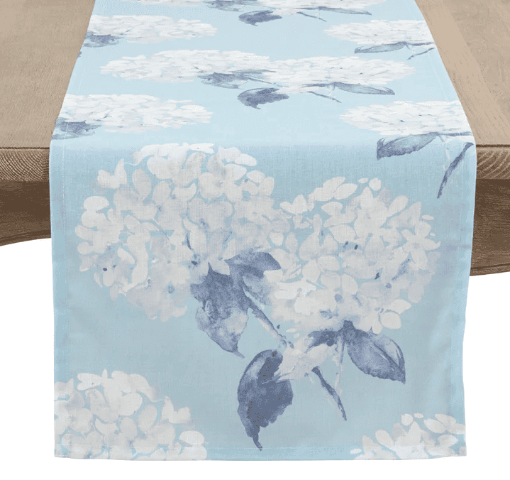 Pale blue and white hydrangea patterned table runner from Wayfair.